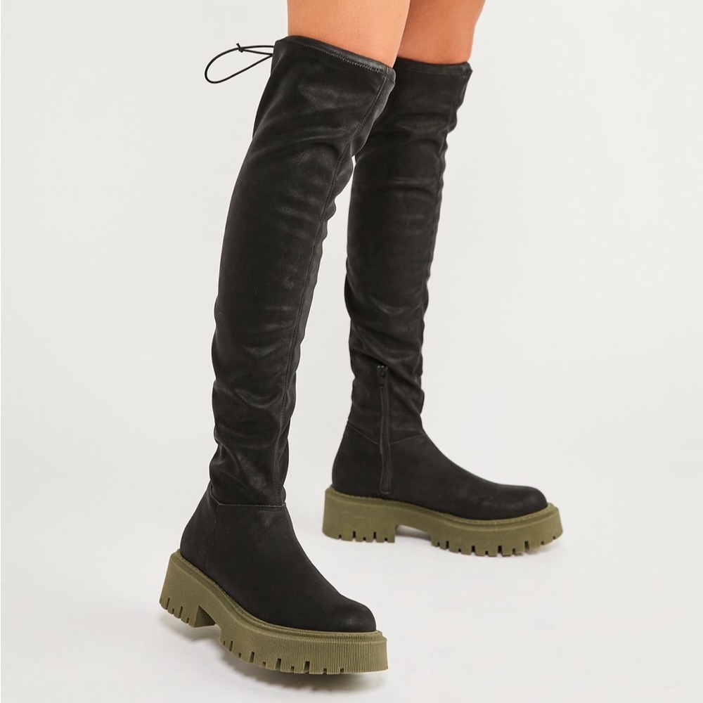 Purchased from Free People over the knee boots with green soles! Great condition